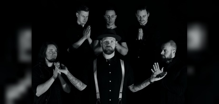 Group photo of the five band members.