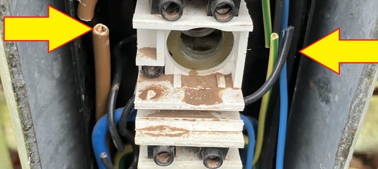 The photo shows a close-up of the damage. Four power cables were cut.