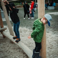 The photo shows children on the climbing facility.