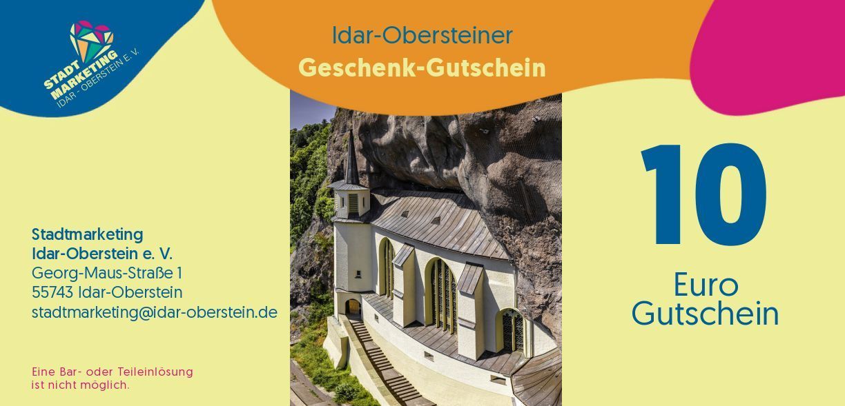 The picture shows the newly designed gift voucher, which is more modern and colorful.