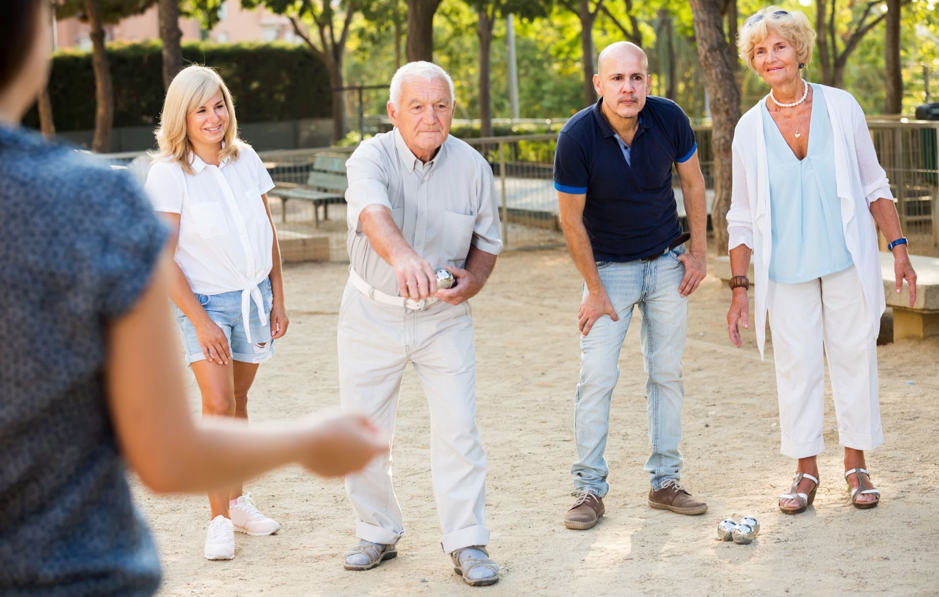 The game of boules is a popular leisure activity for all age groups.