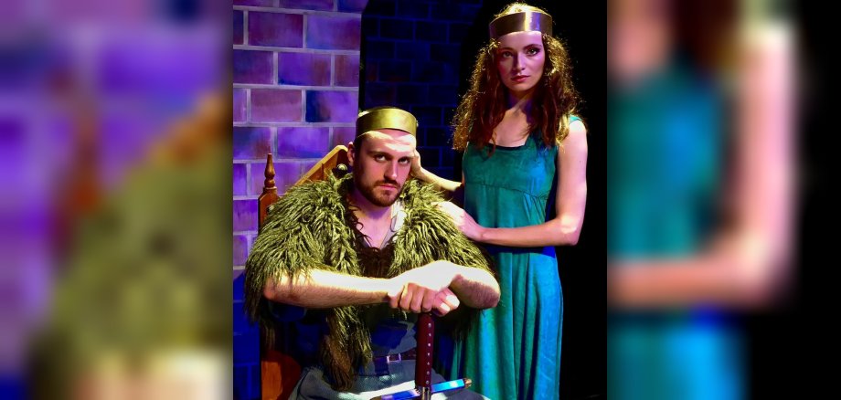 The photo shows the two actors in their costumes.