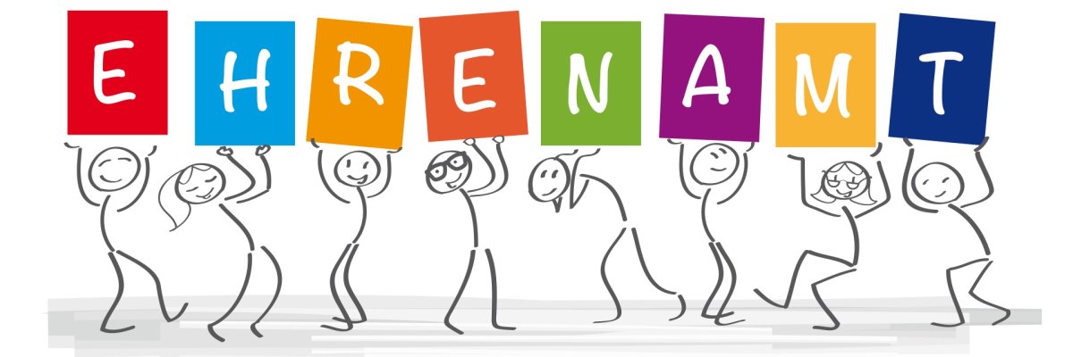 La photo montre des hommes-tirets tenant le mot bénévolat en l'air sous forme de lettres individuelles.