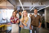 Successful group of designers, business people at work in office Erfolgreiche und selbstbewusste Gruppe junger Menschen