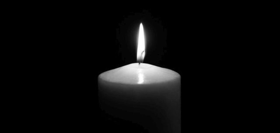 Flame candle isolated on black background.